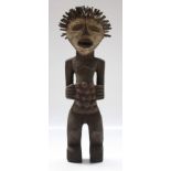 An African wooden Mambila tribal Tadep figure, Cameroon, height 53cm width 15cm at shoulders.