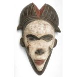 A large African wooden Bakongo tribal mask, Congo, height 42cm width 26cm.