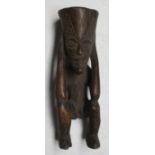 An African wooden Koro tribal cup figure, Nigeria, height 23cm width 8cm.