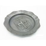 A continental pewter plaque, early 20th century, deeply impressed with a crowned fleur de lis,