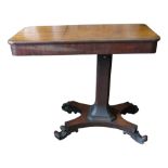 A Victorian mahogany architects type table, with two lift up compartments, on an octagonal stem,