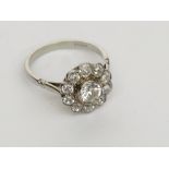 A good 18ct white gold diamond cluster ring,