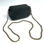 A Chanel black leather quilted evening bag,
