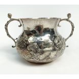 A Charles II silver porringer,