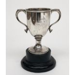 A twin handled silver trophy cup ''Western Hounds / 1st Prize / 1930'',