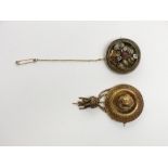 A Victorian matt gold boss brooch with tasselled drop, together with one other Victorian brooch.