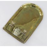 An Edwardian brass wall bracket, of plain arched form with twin candle sconces and lion mask mount,