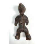 A Chamba figure, Nigeria, 19th century, with slightly outstretched arms, height 26cm.