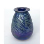 A Peter St Clair studio glass vase, the blue ground with scrolled lustrous decoration,