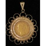 A Victorian young head sovereign, 1887, Sydney mint, good fine, in 9ct gold mount, 13.6g.