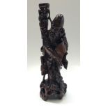 A Chinese carved hardwood figural lamp base, 19th century, height 54cm.