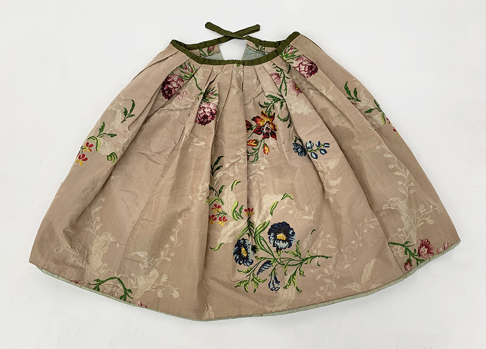 A child's 18th century brocade silk petticoat. Waist to hem: 45cm.