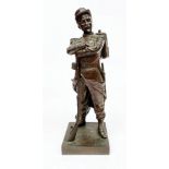 A French bronze of an infantryman, signed Lecornet, modelled in uniform with his gun at his side,