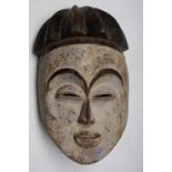 An African wooden Igbo tribal spirit mask, Nigeria, height 33cm width 20cm.