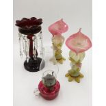 A Victorian ruby glass lustre, height 28.