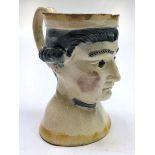 An English creamware jug, late 18th century, representing a bewigged gentleman,