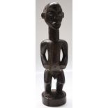 An African wooden Luba tribal maternity figure, Congo, height 54cm width 15cm.