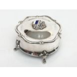 A Mappin & Webb Ltd shaped silver box the lid decorated with enamelled French and British flags.