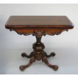 A Victorian rosewood card table, height 75cm, width 92cm.