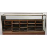 A brass framed and glazed drapers haberdashery unit, Grant-shopfitters, Edinburgh,