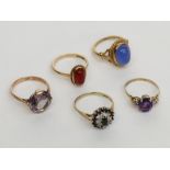 Five 9ct gold stone set rings.