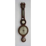 A Victorian mahogany wheel barometer, with architectural pediment,