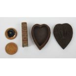 An 18th century heart shaped small chip carved box together with a book form snuff box and a treen