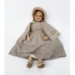 Wax doll circa 1810. Height: 58cm. Cloth body construction with wax head, arms and legs.