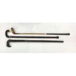 An ebony and bone walking stick, with turned twist stem, length 83cm,