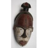 An African wooden Ogoni tribal mask, Nigeria, height 36cm width 15.5cm.