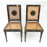 A pair of Edwardian black japanned side chairs, with rattan back and seat, height 87cm.