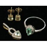 A tourmaline and diamond ring in 9ct gold, a matching pendant and a pair of zultanite earrings.