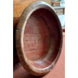 A huge Eastern wooden shallow bowl, of coopered metal bound construction, height 22cm,