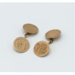 A pair of 9ct gold cufflinks initialled RHB, 5.2g.