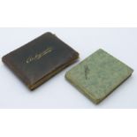 A leather bound autograph album, containing sketches, musings and signatures dating from 1912-1914,