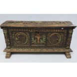 A continental carved boarded chest apparently of immense antiquity, width 113cm.