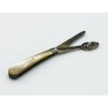 An Edwardian patent orange peeler with folding blades and mother of pearl handle,