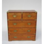 An unusual mid Victorian mahogany two-section campaign secretaire chest of small proportions with