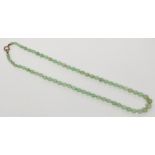 A jade necklace, the largest bead 8.6mm.