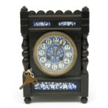 An Aesthetic movement ebonised oak mantel clock, with blue,