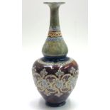 A Doulton Lambeth baluster vase, with applied floral and scroll decoration, height 40cm.
