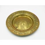A brass alms dish, probably German late 17th/18th century,