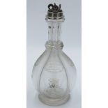 An Edwardian Humphrey Taylor four division glass liqueur decanter,