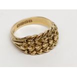 An early 20th century 18ct gold plaited ring, hall mark Birmingham 1910, 8.6g.