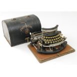 An Imperial Model B portable typewriter, stamped with patents for Great Britain, France,