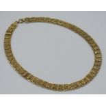 A 9 ct. gold necklace of five bar gate link construction, 28.6 g.