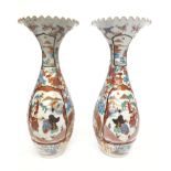 A large pair of Japanese porcelain vases, Meiji period,