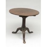 A George III mahogany tripod table,