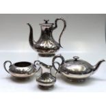 An Elkington mid 19th century engraved four piece tea and coffee service.