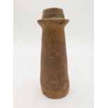 A section of Roman terracotta water pipe, of tapered form, length 28cm.